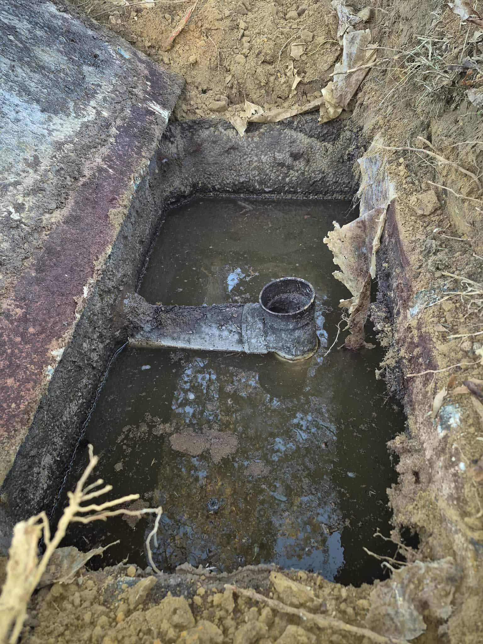 Stephens Septic Service truck on a job site in Marshall County, AL