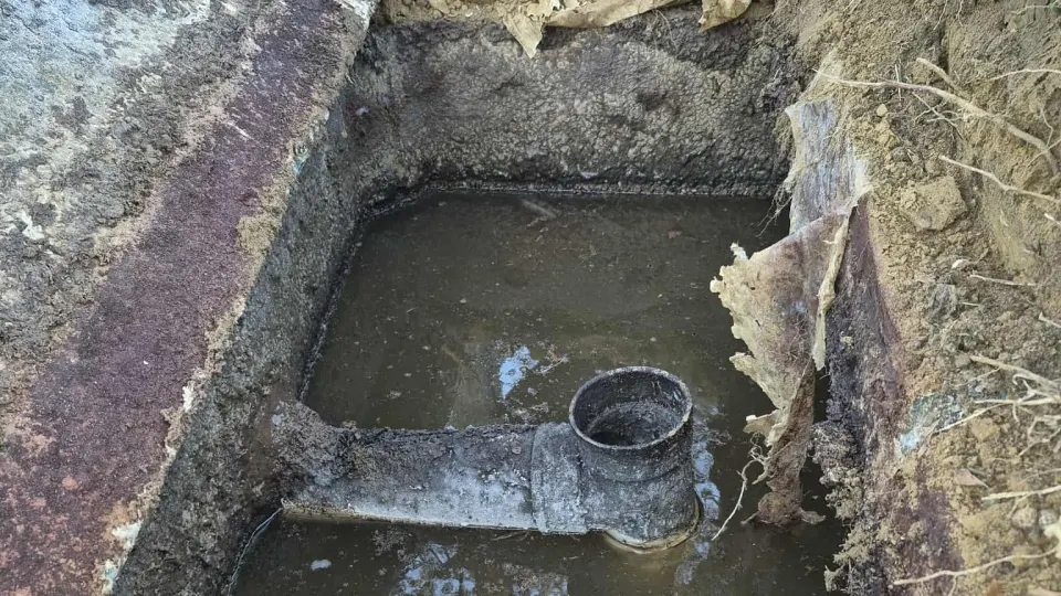 Open septic pump chamber during alarm troubleshooting